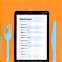 Iconographic representation of food service industry: a fork and knife, integrated with a modern website layout on a tablet.