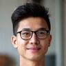 Headshot of David Chen, a professional looking art director.